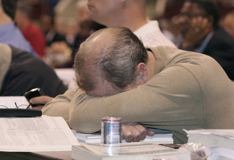 A delegate catches a quick nap in between presentations on the eighth day of the 10-day 2008 United Methodist General Conference in Fort Worth, Texas.