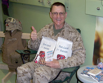 Chaplain Ron Newhouse from New Covenant United Methodist Church, Edmond, Okla., coordinates care packages from his tent in Iraq. A UMNS 2006 file photo courtesy of Ron Newhouse.
