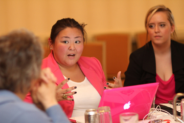 Bethany Amey makes a point during a discussion at the Connectional Table. Both Amey and Stefanie Schutz, right, represent the Division on Ministries with Young People for the United Methodist Board of Discipleship. A UMNS photo by Kathleen Barry.