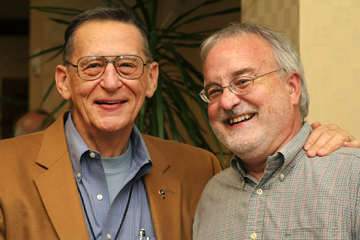 Joe M. Whittemore and the Rev. Andy Langford, both with the Southeastern Jurisdiction, share conversation during a break in the meeting of the Connectional Table. A UMNS photo by Kathleen Barry.