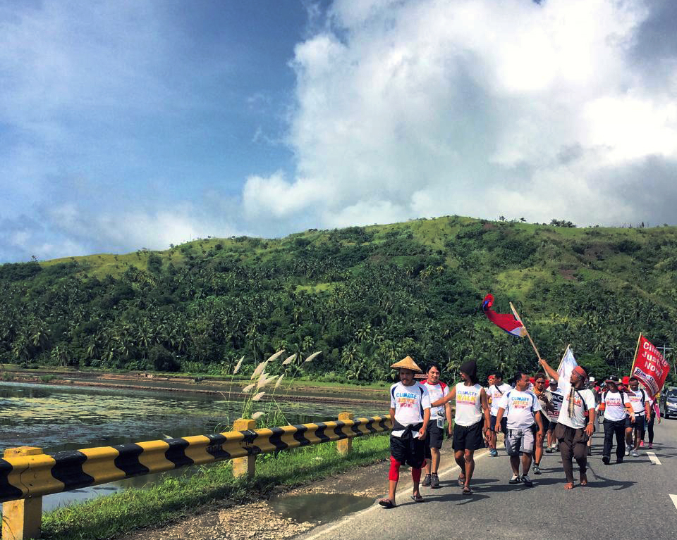 Marchers who spent 40 days on the road to call attention to climate change are shown near Basey. Photo courtesy of the marchers