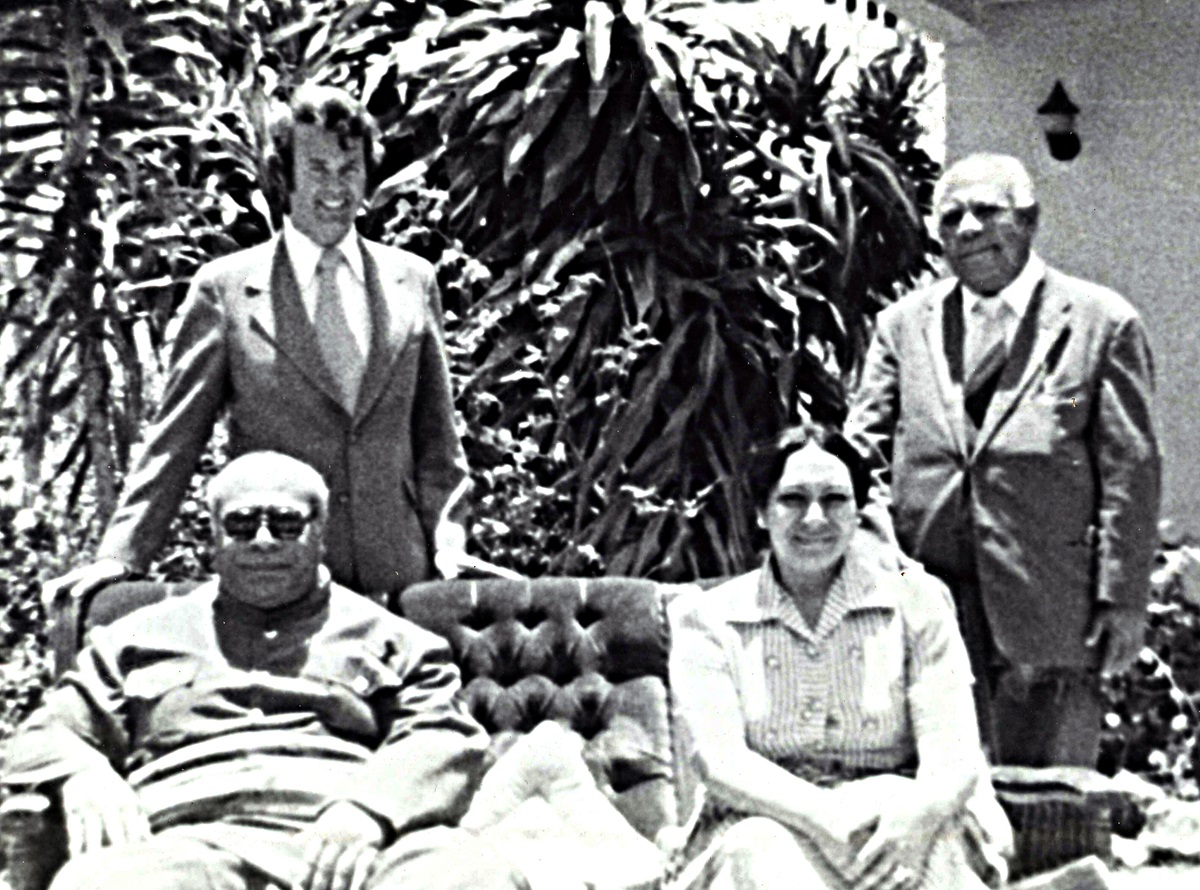 The Rev. H. Eddie Fox (left, rear) poses with King Tāufaʻāhau Tupou IV and Queen Halaevalu Mataʻaho ʻAhomeʻe of Tonga (seated) in 1975. Photo courtesy of the Rev. H. Eddie Fox