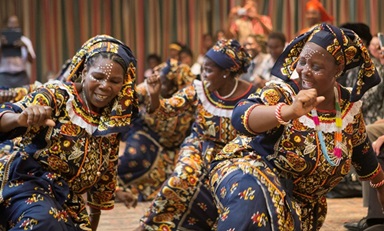 United Methodist women present a traditional dance from northern Mozambique during a meeting of the Standing Committee on Central Conference Matters and Connectional Table. Photo by the Rev. Rodney Steele