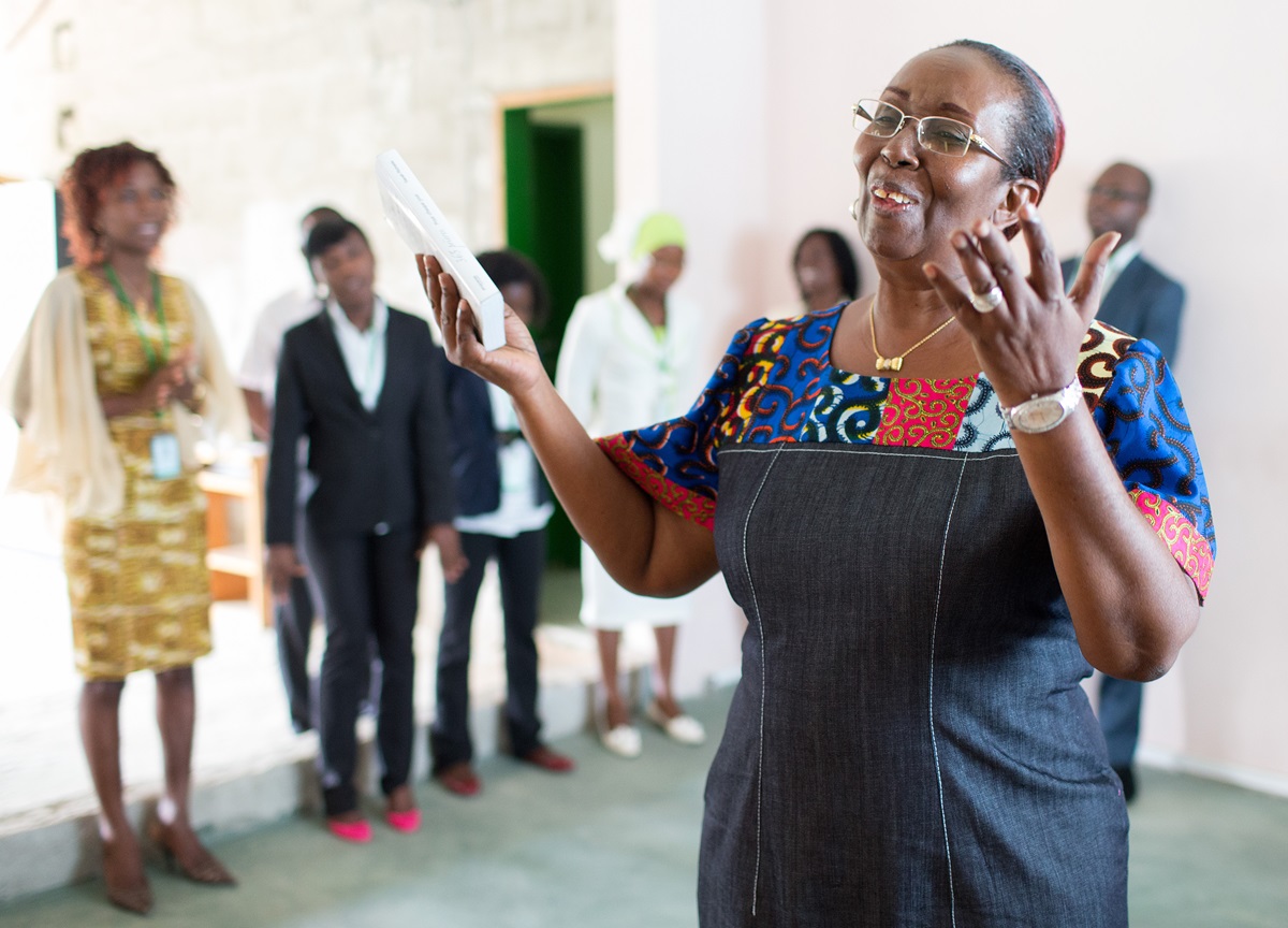 Lydie Acquah, director of The United Methodist Church's Voice of Hope radio station in Abidjan, Côte d'Ivoire, leads a devotional service for station staff. Photo by Mike DuBose, UMNS