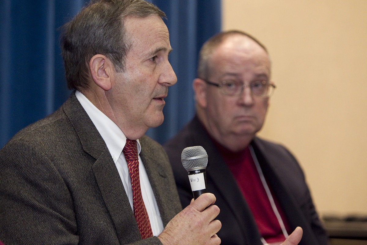 Economist Don House (left) helps lead a discussion about the church budget during the 2012 pre-General Conference news briefing at the Tampa Convention Center in Florida in this file photo. At right is Bishop G. Lindsey Davis. File photo by Mike DuBose, UMNS 