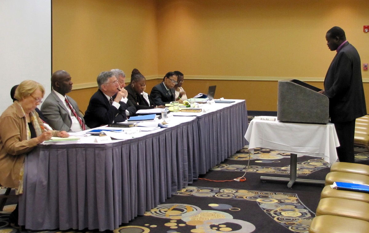 East Africa Area Bishop Daniel Wandabula appears before the Judicial Council on Oct. 25, 2012 in Elk Grove Village, Ill. The denomination’s General Council on Finance and Administration advises withholding funds from his area until its complaint against the bishop is resolved. 