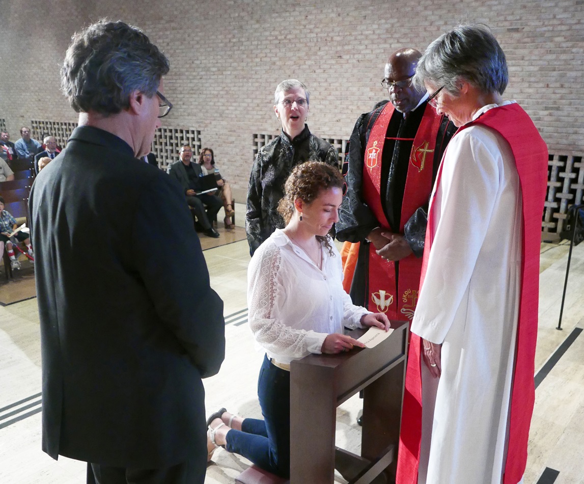 Veronica Apecena kneels during the commissioning of new missionaries Oct. 1 at the Interchurch Center chapel in New York. 