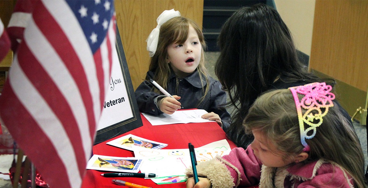 Children at First United Methodist Church of Lancaster, Pa., write thank you notes to give to wounded veterans and those serving in the military. A UMNS photo by Gwen Kisker. 