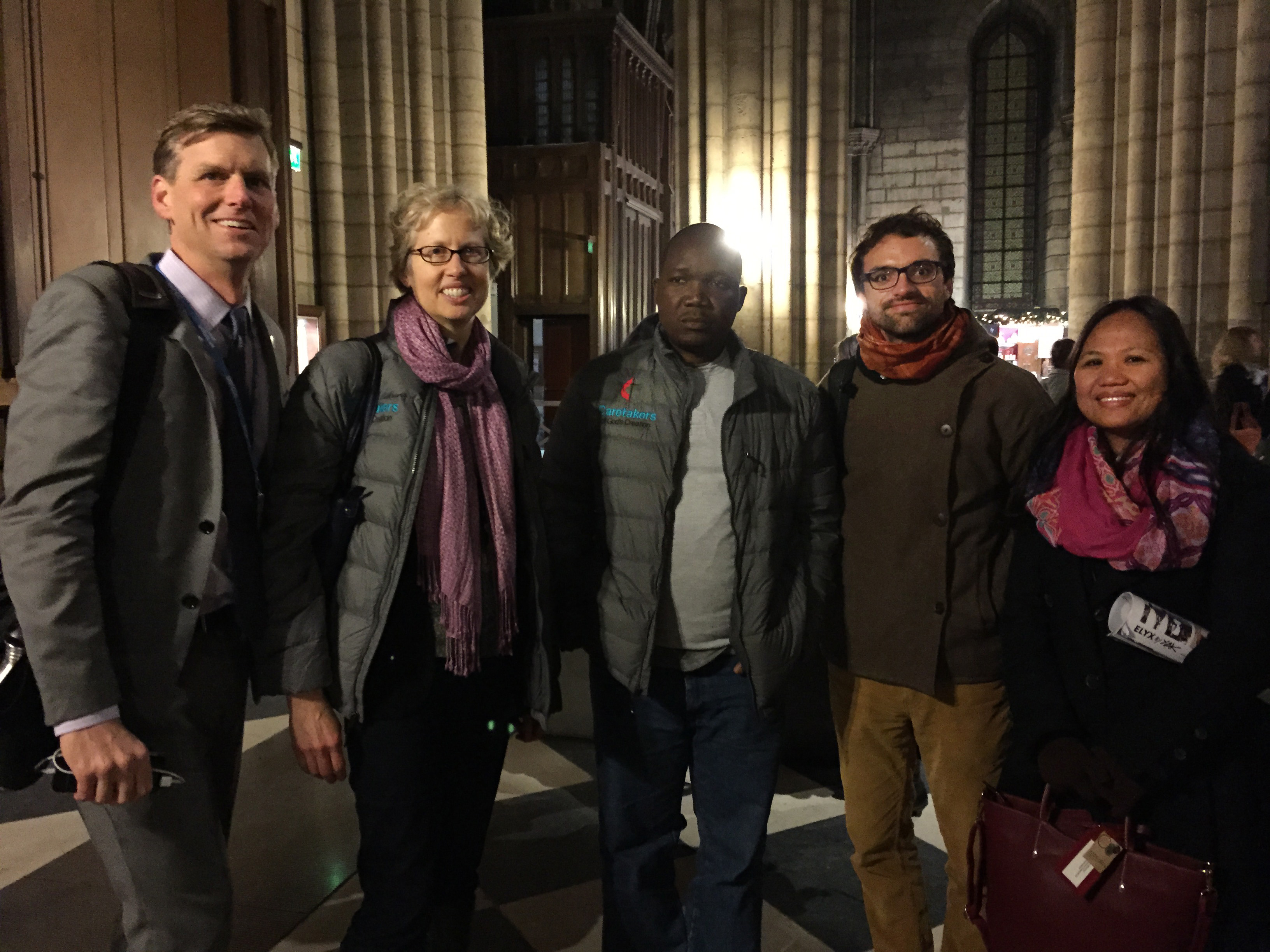 From left, John Hill and Susan Mullen, U.S., Jefferson Knight, Liberia; Daniel Obergfell, Germany, and Jennifer Ferariza Meneses, Philippines, at the Cathedral of Notre Dame in Paris. They were part of the teams from the United Methodist boards of Global Ministries and Church and Society at the U.N. climate summit. Photo courtesy of the Board of Church and Society