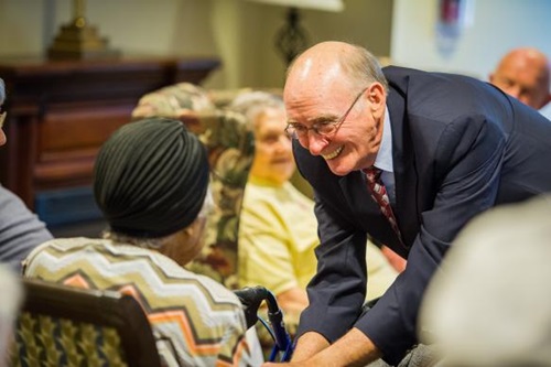 After worship services in the Bethany memory care unit, retired United Methodist Bishop Kenneth Carder goes around the room, greeting each resident by name. Carder is serving as interim chaplain at Bethany, part of the Heritage at Lowman senior community near Columbia, S.C.