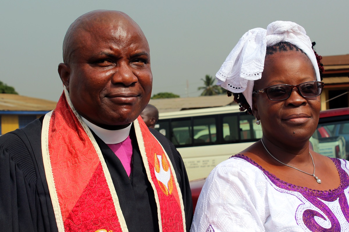 Bishop Samuel J. Quire Jr. (left) and his wife, Richlain K. Quire, at his induction ceremony on Dec. 31, 2016, at Tubman United Methodist Church. During the service, Quire said he wants to ensure that the church’s resources — natural, human, spiritual and financial — benefit all members. Photo by Julu Swen, UMNS.