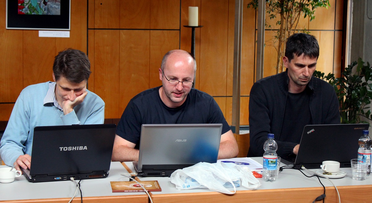 Zoltán Kovács (left) of Hungary, Filip Gärtner (center) and Ctirad Hruby, both from the Czech Republic, work on laptops during a seminar of the of the Methodist e-Academy that includes presentations from students and lectures by teachers. The e-Academy  is helping with a new online library of Methodist and Wesleyan resources. Photo by Bernfried Schnell, UMNS