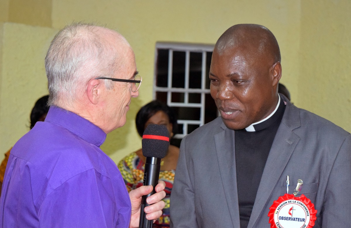 Bishop Patrick Streiff, left, of the Central and Southern Europe Episcopal Area, greets the Rev. Daniel Onashuyaka Lunge after he is elected a United Methodist bishop by delegates at the Congo Central Conference on March 18. Lunge, 59, was elected at the quadrennial meeting in Kamina. Photo by Eveline Chikwanah, UMNS.