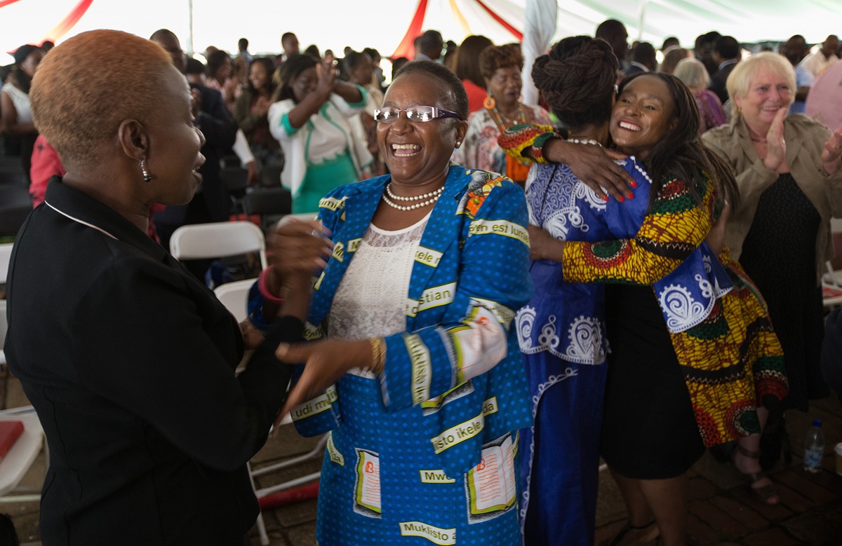Supporters of Africa University celebrate at the close of Sunday worship during the 25th anniversary celebration for Africa University in Mutare, Zimbabwe. Photo by Mike DuBose, UMNS.