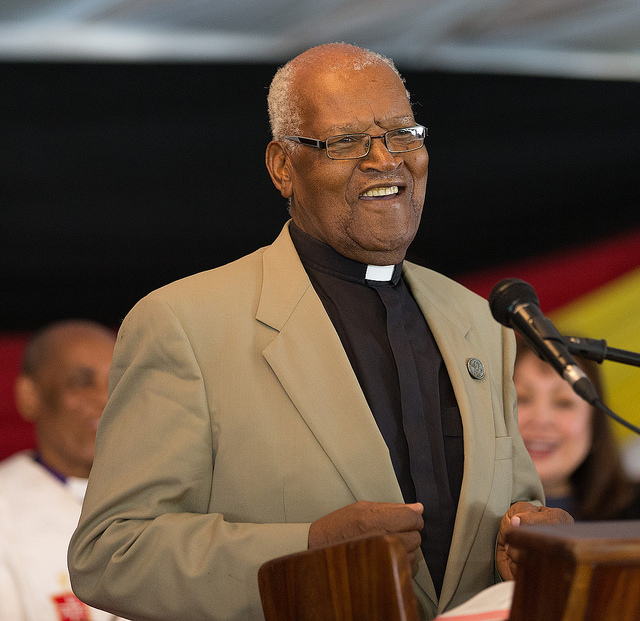 The Rev. John Kurewa helps lead Sunday worship during the 25th anniversary celebration for Africa University in Mutare, Zimbabwe. Kurewa was the United Methodist institution's founding vice chancellor. Photo by Mike DuBose, UMNS.