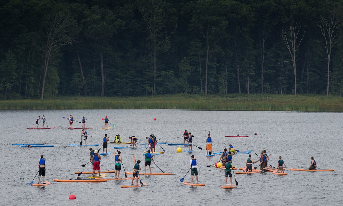 Scouts try paddle boarding at the 2017 National Scout Jamboree held July 19-28 at the Summit Bechtel Reserve in Glen Jean, W.Va. The United Methodist Church is the second-largest faith group represented at the event, with 3,500 professed United Methodists at the Boy Scouts of America’s quadrennial celebration. Photo by Mike DuBose, UMNS.