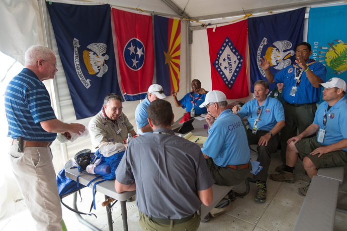 Volunteer chaplains begin their day with a staff meeting at the 2017 National Scout Jamboree at the Summit Bechtel Reserve in Glen Jean, W. Va. The United Methodist Church was the second-largest faith group represented at the event, with 3,500 professed United Methodists attending the Boy Scouts of America&rsquo;s quadrennial celebration July 19-28. Photo by Mike DuBose, UMNS.