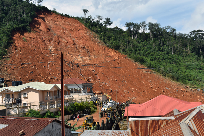 The second day of efforts to recovery bodies at the scene of a devastating mudslide at Sugar Loaf Mountain in Freetown, Sierra Leone, on Aug. 15. Photo by Phileas Jusu, UMNS.  