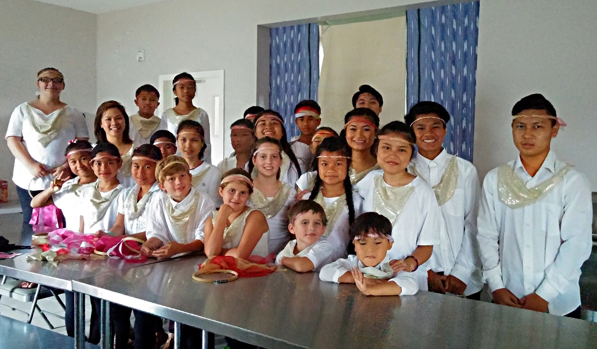 Youth wear traditional Karen outfits for a new year’s celebration at Rhems United Methodist Church. Church members prayed for children, and they believe God answered those prayers. Photo courtesy of Rhems United Methodist Church