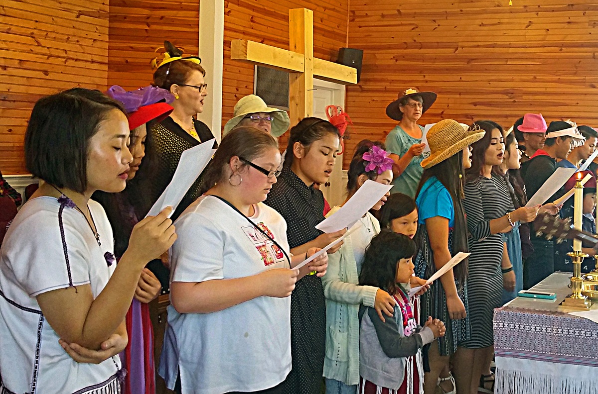 The choir of Rhems United Methodist Church in New Bern, N.C., sings an anthem on Palm Sunday. The rural church has seen its ministry grow with the addition of Karen refugees from Burma. Photo courtesy of Rhems United Methodist Church.