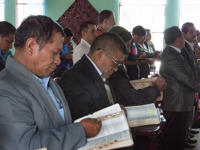 Pastors from Patuluc 1 and members of Iglesia Nacional Methodista Fuente De Vida, Guatemala, participate in worship service on July 24.