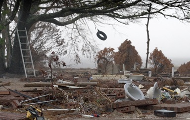 A tire swing sways in the wind from Hurricane Rita over the remains of a beachfront home destroyed by Hurricane Katrina in Ocean Springs, Miss. Rita made landfall in East Texas Sept. 24, 2005, nearly four weeks after Katrina hit Louisiana and Mississippi. Photo by Mike DuBose, UMNS. A tire swing sways in the wind from Hurricane Rita over the remains of a beachfront home destroyed by Hurricane Katrina in Ocean Springs, Miss. Rita made landfall in East Texas Sept. 24, 2005, nearly four weeks after Katrina hit Louisiana and Mississippi. Photo by Mike DuBose, UMNS.