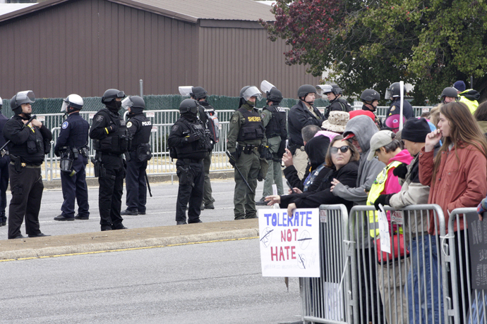 In Shelbyville, Tenn., law enforcement kept the white nationalists and counterprotesters cordoned off into separate sections across a four-lane road. To enter either side, people had to go through two checkpoints where law enforcement swiped them with metal detectors. Photo by Kathy L. Gilbert, UMNS.