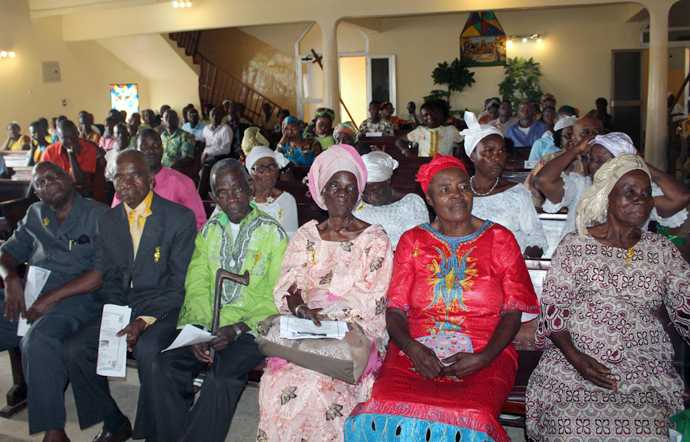Six of the senior citizens honored at John Jackson Powell United Methodist Church in Monrovia, Liberia, sit on the front pew during services. The Liberia Conference observes the third Sunday of October each year as Senior Citizens Sunday. Photo by Julu Swen, UMNS.