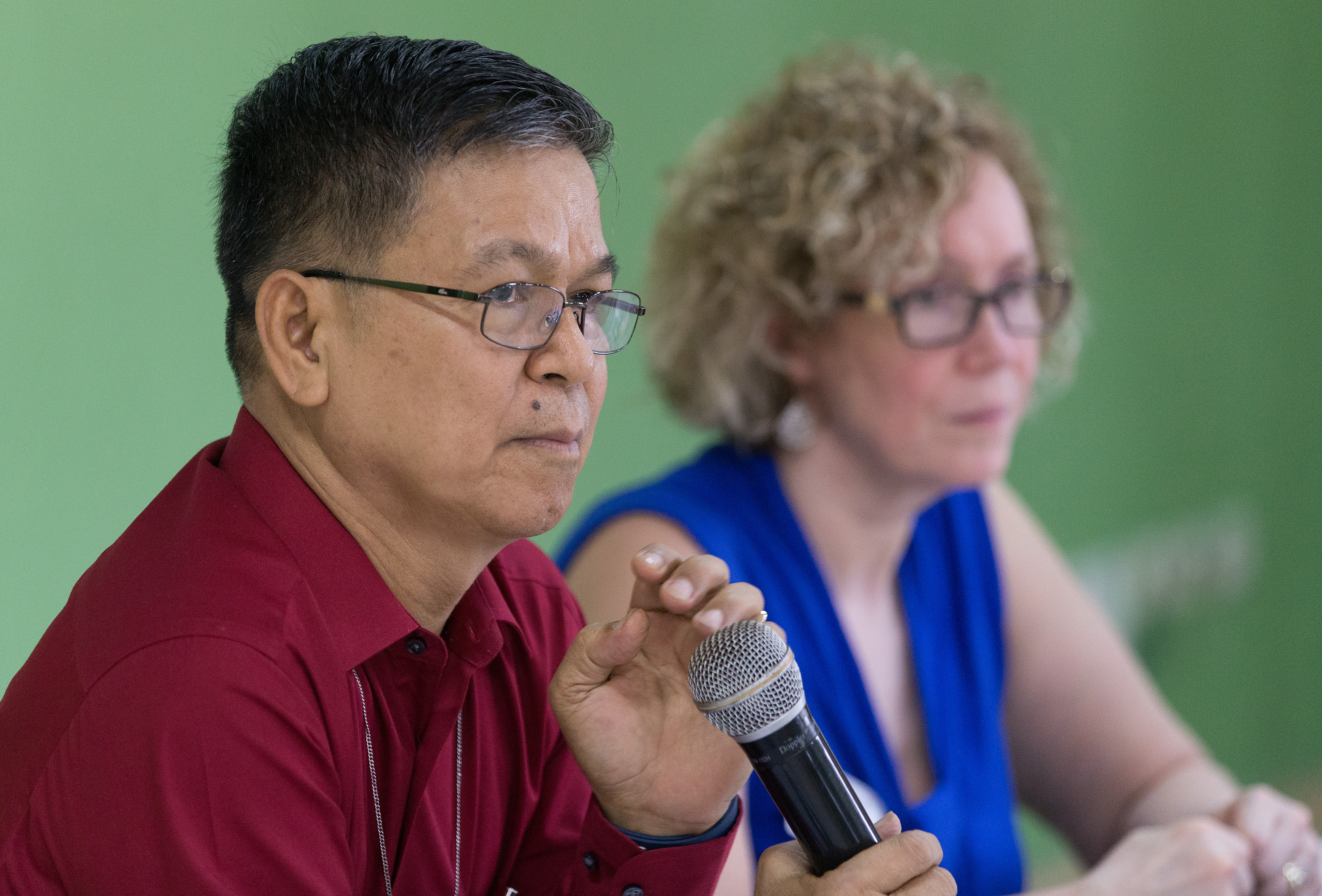 Bishop Ciriaco Q. Francisco (left) presides over a meeting of the United Methodist Committee on Central Conference Matters in Abidjan, Côte d'Ivoire. At right is the Rev. Deanna Stickley-Miner. Photo by Mike DuBose, UMNS.
