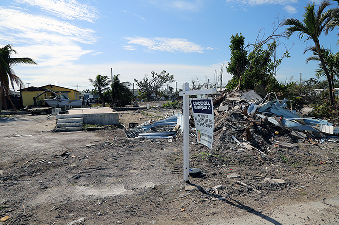 A realtor’s sign stands in front of a razed house in Big Pine Key, Fla. Photo by Deborah Coble, Florida Conference.