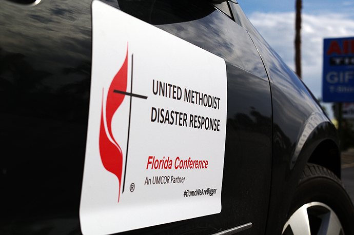 A Florida Conference vehicle displays a magnetic sign identifying it as a disaster response unit. Photo by Gustavo Vasquez, UMNS.