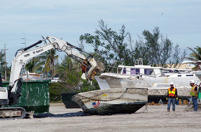 A closed golf course in Marathon Key, Fla., has become a makeshift site where boats that were unmoored and damaged by Hurricane Irma are demolished. Photo by Joey Butler, UMNS.