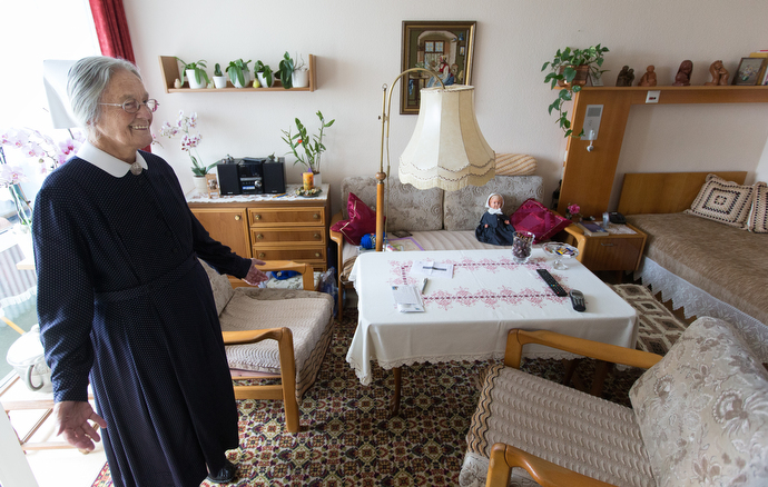 Sister Rita Seebach, a United Methodist Deaconess, welcomes visitors to her room in a retirement home in Frankfurt, Germany.