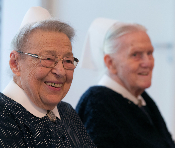 Sisters Lilly Groß (left) and Rose Häußermann enjoy lunch together at their retirement home attached to the United Methodist headquarters in Frankfurt, Germany. Photo by Mike DuBose, UMNS.