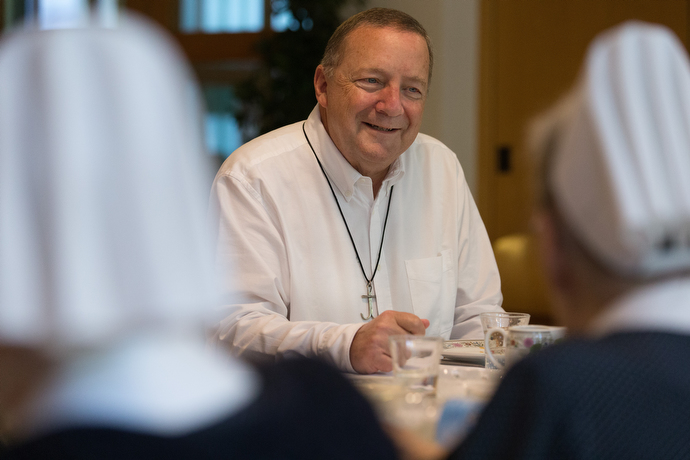 The Rev. George Miller visits with United Methodist deaconesses in Frankfurt, Germany. Miller is a United Methodist missionary and has an office in the building where the sisters live. Photo by Mike DuBose, UMNS.