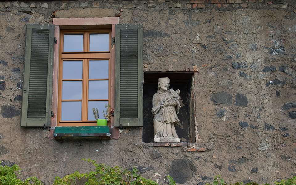 A statue of Saint John of Nepomuk looks out over the Main River in the historic Höchst district of Frankfurt, Germany. Photo by Mike DuBose, UMNS.