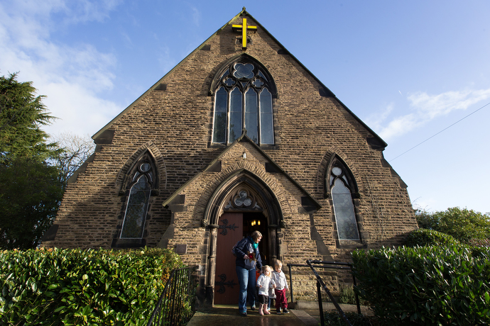 Families with young children leave St. Mary's Methodist Church in Handforth, England, after a nativity service. The church is open every Friday for quiet prayer and conversation. Photo by Mike DuBose, UMNS.