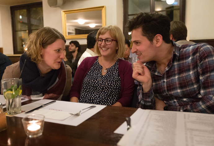 The Rev. Mareike Bloedt (center), pastor of the United Methodist Church in Central Stuttgart, Germany, visits with Miriam Schäuble (left) and Iskandar Obaid during a monthly dinner gathering at a local restaurant. “I saw there was nothing for young adults. They were losing their connection with church,” Bloedt said. “We have five or six people every month, sometimes as many as 15. We talk a lot about faith.” Photo by Mike DuBose.