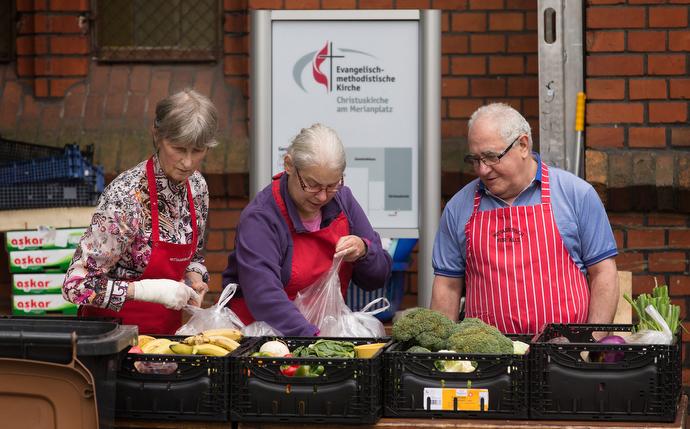 Volunteers prepare for a weekly flea market and produce sale at The United Methodist Church-Frankfurt City. Photo by Mike DuBose, UMNS.