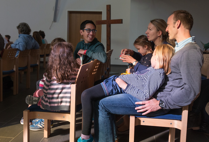 Families gather for worship at the United Methodist Church of the Redeemer in Munich. Photo by Mike DuBose, UMNS.