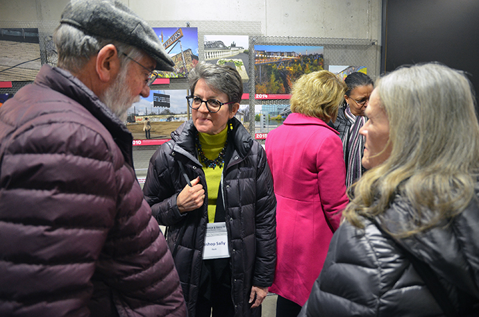 Chicago Area Bishop Sally Dyck speaks with others in the Visitor Center at the Berlin Wall Memorial Bernauer Strasse during the March 15-18 meeting of The United Methodist Board of Church and Society held in Berlin. Photo by the Rev. Klaus U. Ruof