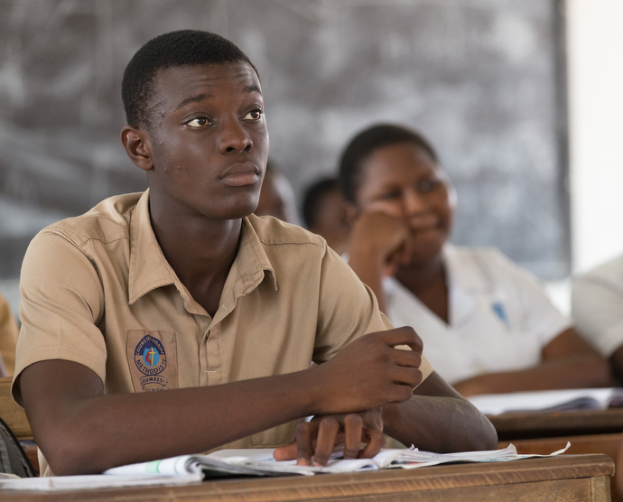 Students listen to their teacher at the United Methodist Koumassi School in Abidjan. Photo by Mike DuBose, UMNS.
