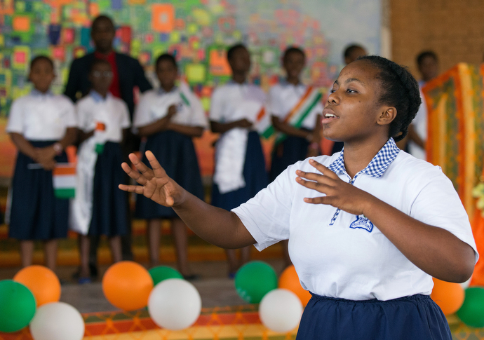 Maruela Kpanigo leads the choir at the United Methodist Anyama School in Abidjan. Photo by Mike DuBose.