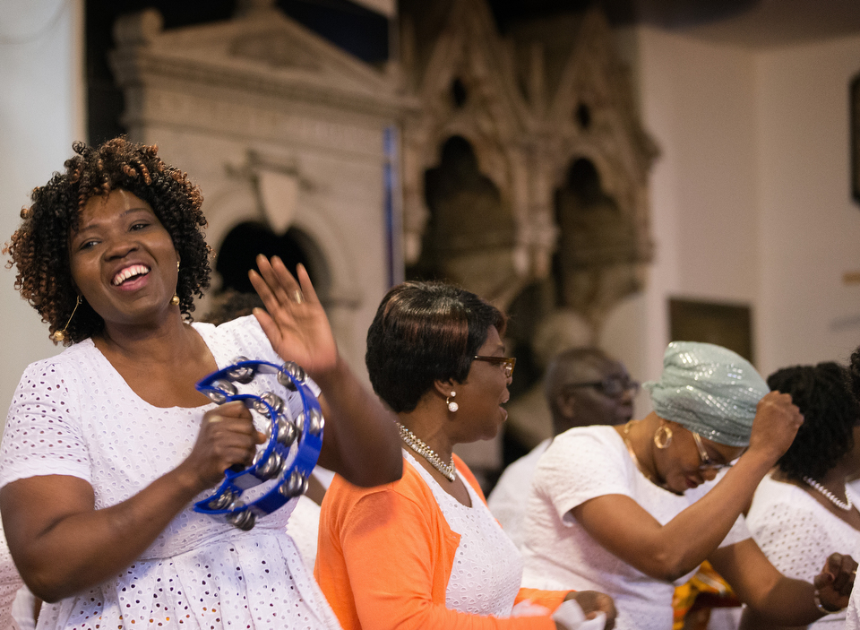 Harriet Appiah-Anderson (left) sings with the choir at Wesley's Chapel in London. She is chair of the church's Ghanaian fellowship. Photo by Mike DuBose, UMNS.