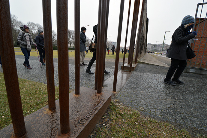 Visitors explore the Berlin Wall Memorial. Metal bars indicate where the boundary of the wall was, with the area to the left being the former East Berlin and to the right, the former West Berlin. Photo by the Rev. Klaus U. Ruof, UMNS.