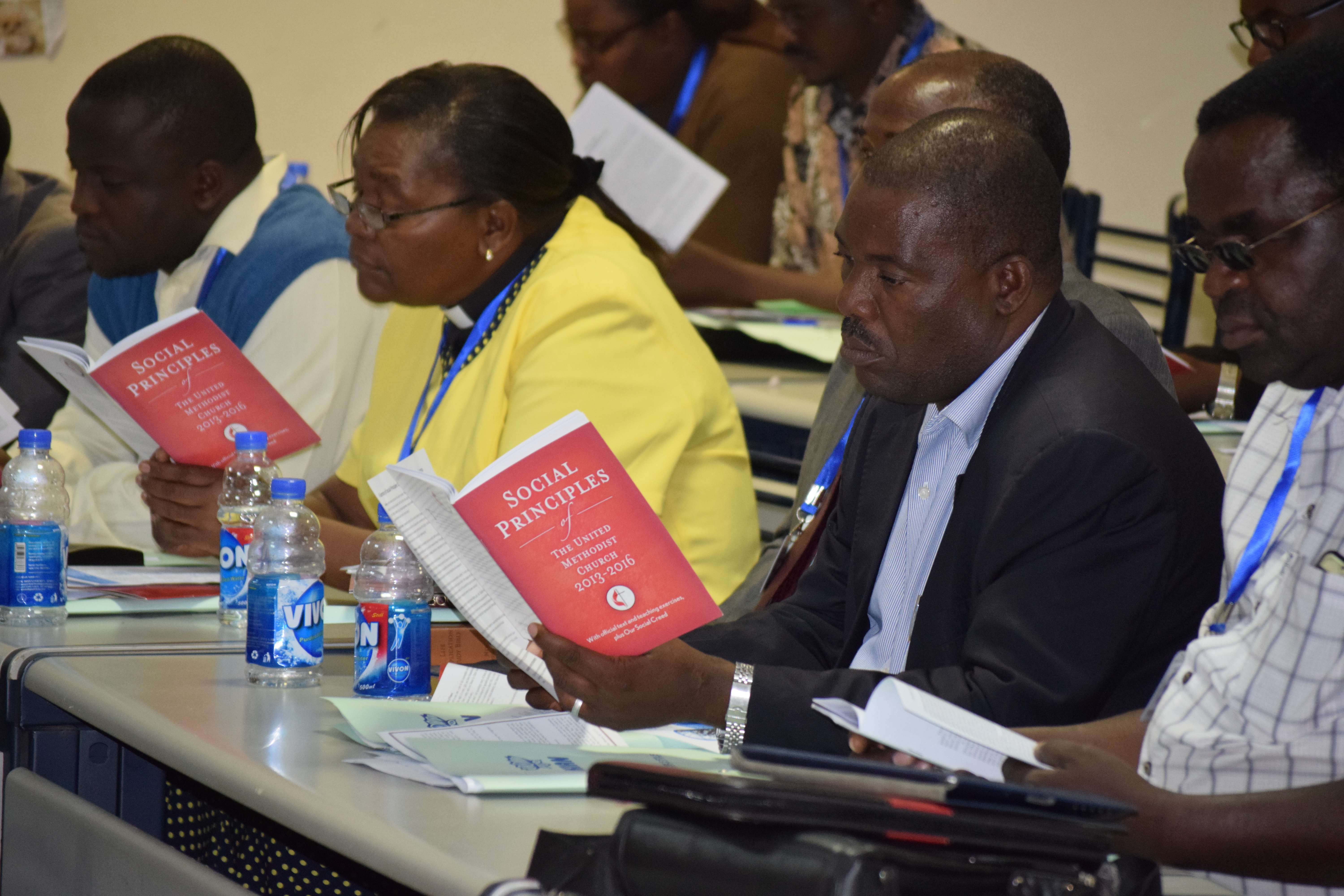 Attendees study of a Social Principles Training at Africa University in 2017 study their copies of the principles. File photo courtesy of Church and Society.