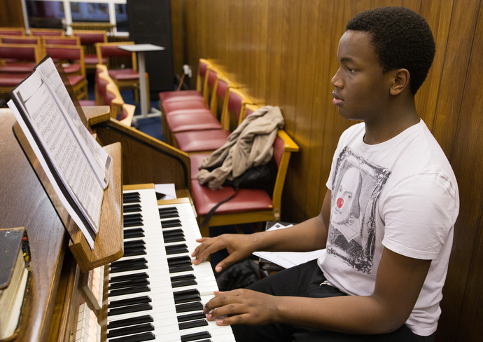 Winston Shaw, 17, stops by after school to practice the organ at Bermondsey Central Hall Methodist Church. “I try to repay my love for God through music,” Shaw said. Photo by Mike DuBose, UMNS.