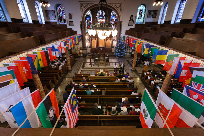 Flags of the nations represented by the diverse congregation of Wesley's Chapel ring the balcony of the historic church. Photo by Mike DuBose, UMNS.