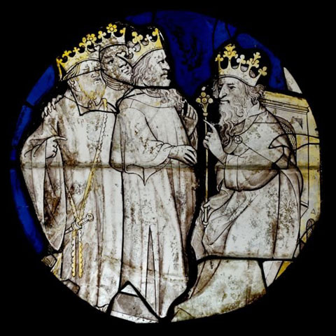 The three wise men appear before King Herod in this stained-glass window by an anonymous artist. Despite their crowns, the magi were not kings in the Bible. A web-only public domain image.