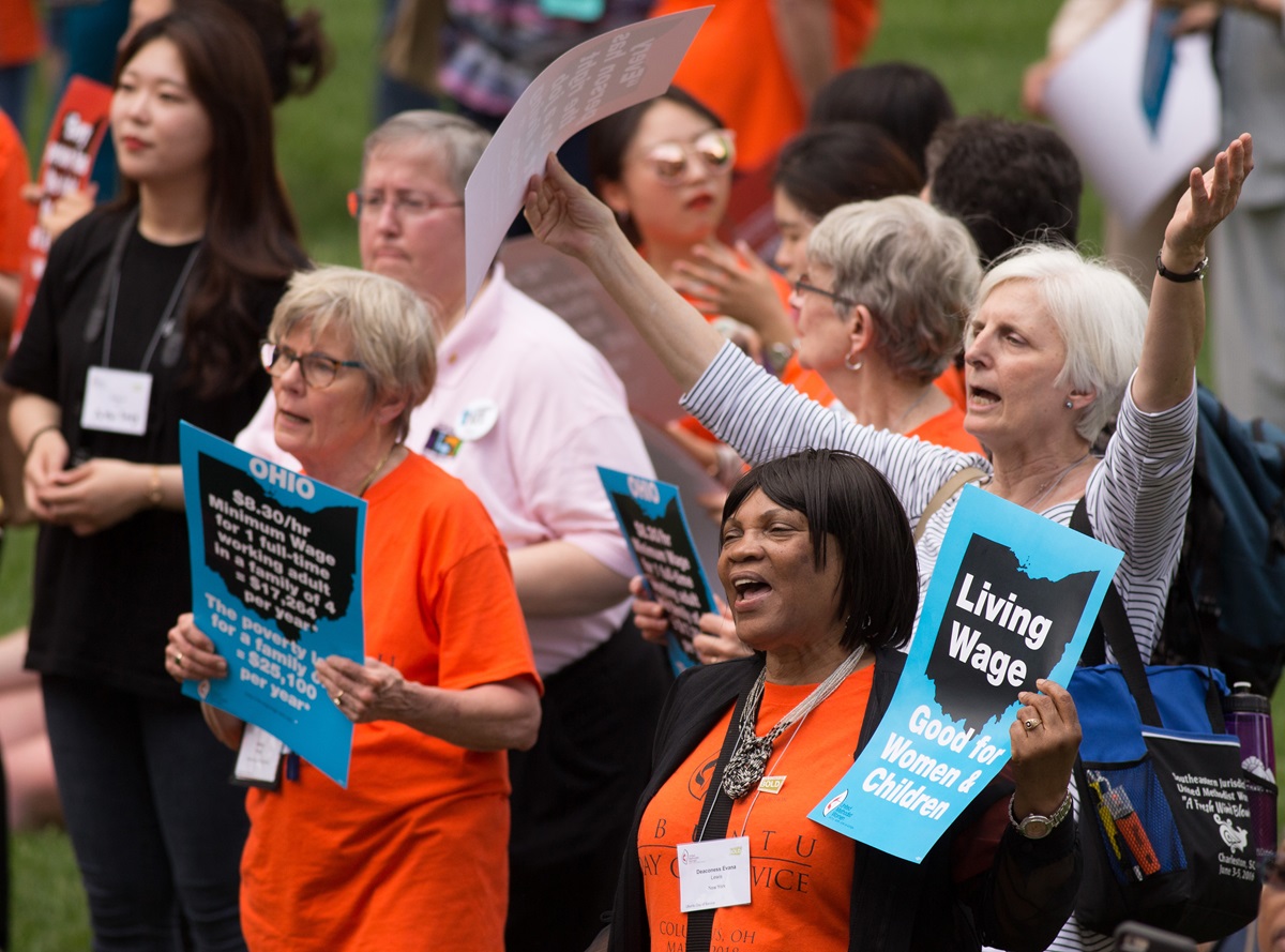 Deaconess Evana Lewis (front) of the New York Conference joins other United Methodist Women in a rally for a fair living wage on the steps of the Ohio Statehouse in Columbus during the United Methodist Women Assembly 2018. Photo by Mike DuBose, UMNS.